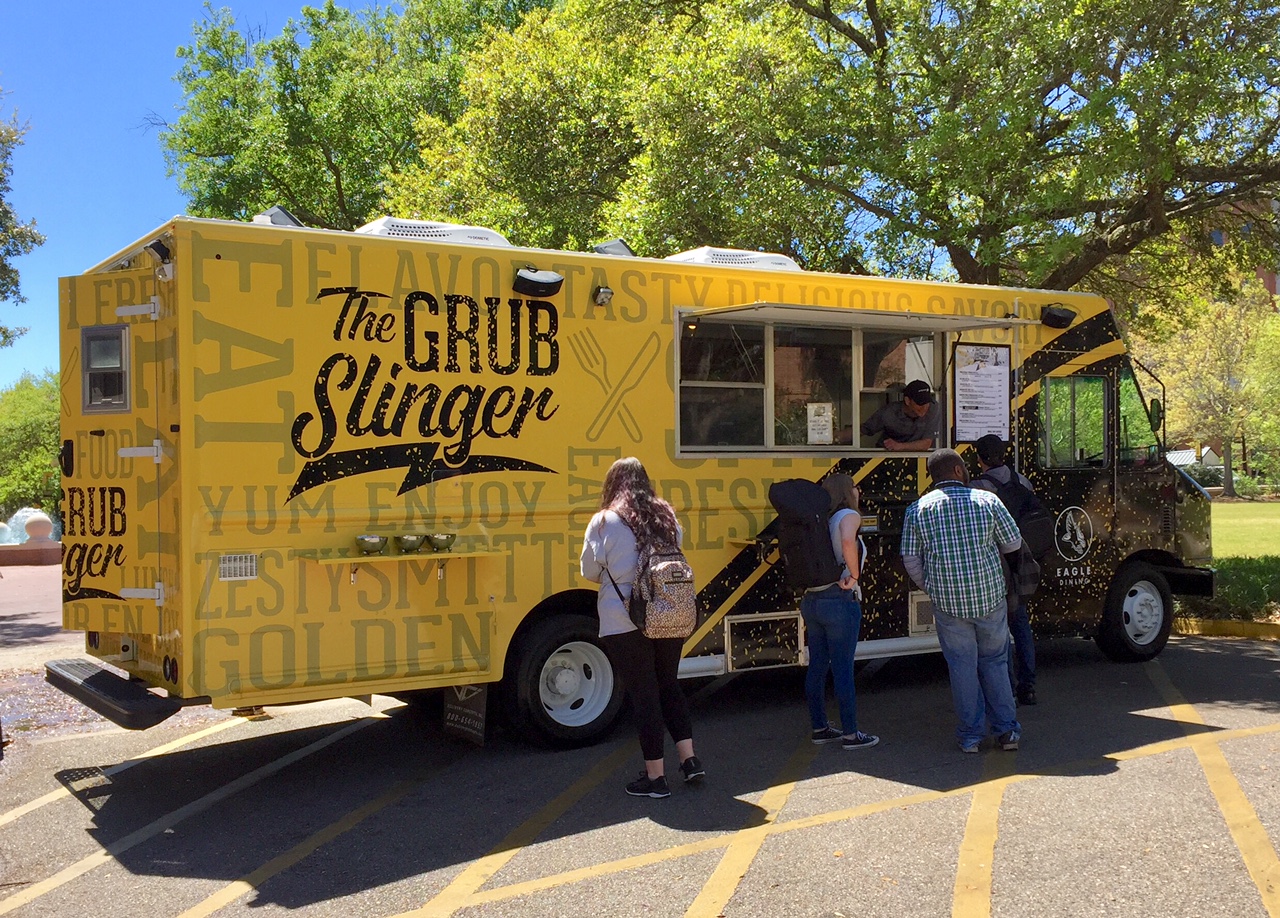 The Grub Slinger food truck serving food to students