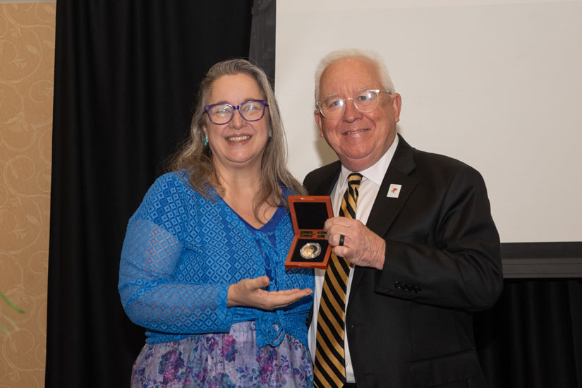 Award-winning author Cynthia Leitich Smith was presented the 2024 Southern Miss Medallion, the highest award given at the annual Fay B. Kaigler Children’s Book Festival, by USM President Dr. Joseph S. Paul (USM photo by Kelly Dunn).