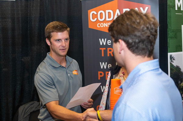 USM Student Networking with Codaray Constuction Team Member