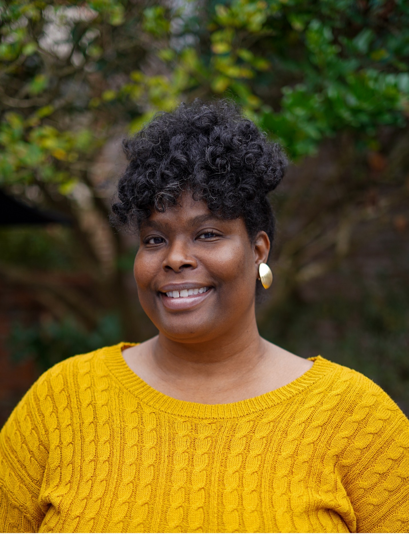K. Easley Photo of Kentrice Easley, African American woman with gold top