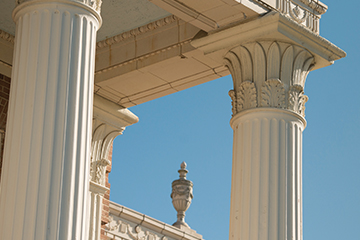 Decorative columns against the blue sky