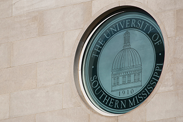 USM Official Seal set into wall