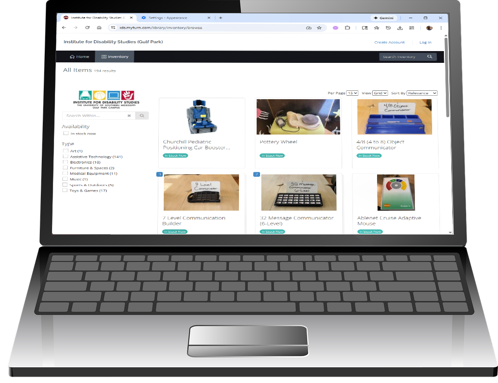 laptop with the loaning library web page on the screen