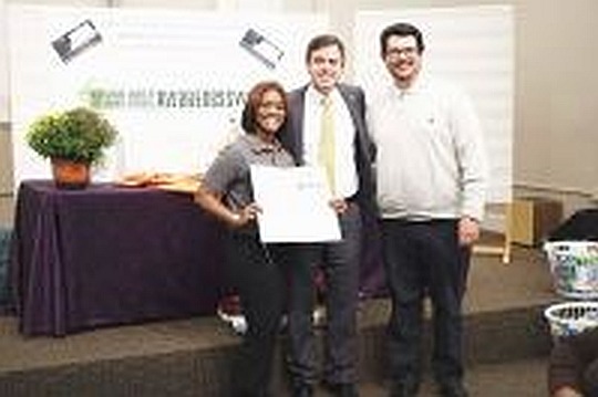 Mayor Barker recognizes IDS Housing for their work with the homeless population. Dr. Demetra Bates and Dr. Jerry Alliston accepted the award.