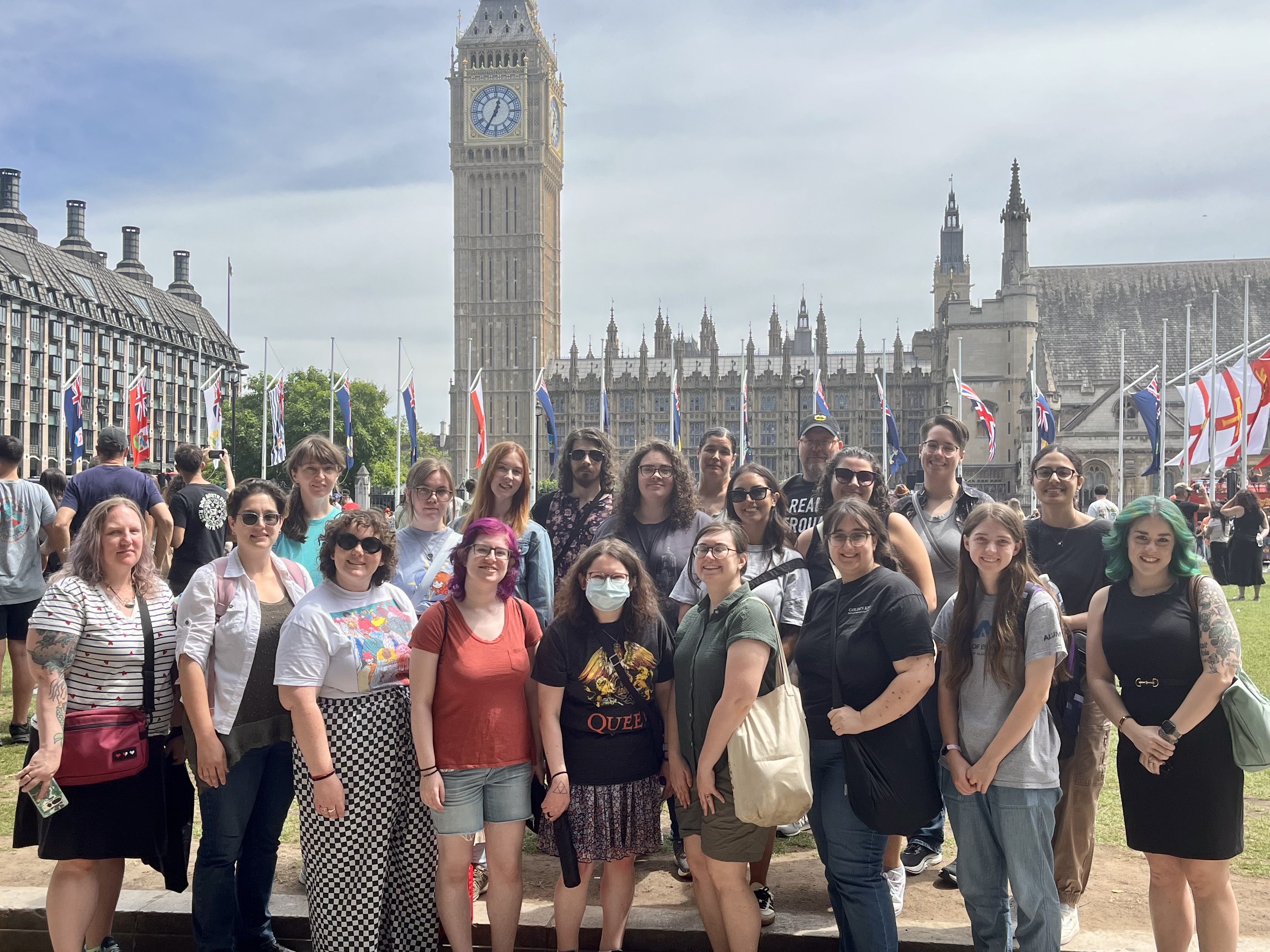 Group of students standing in front of London Skyline