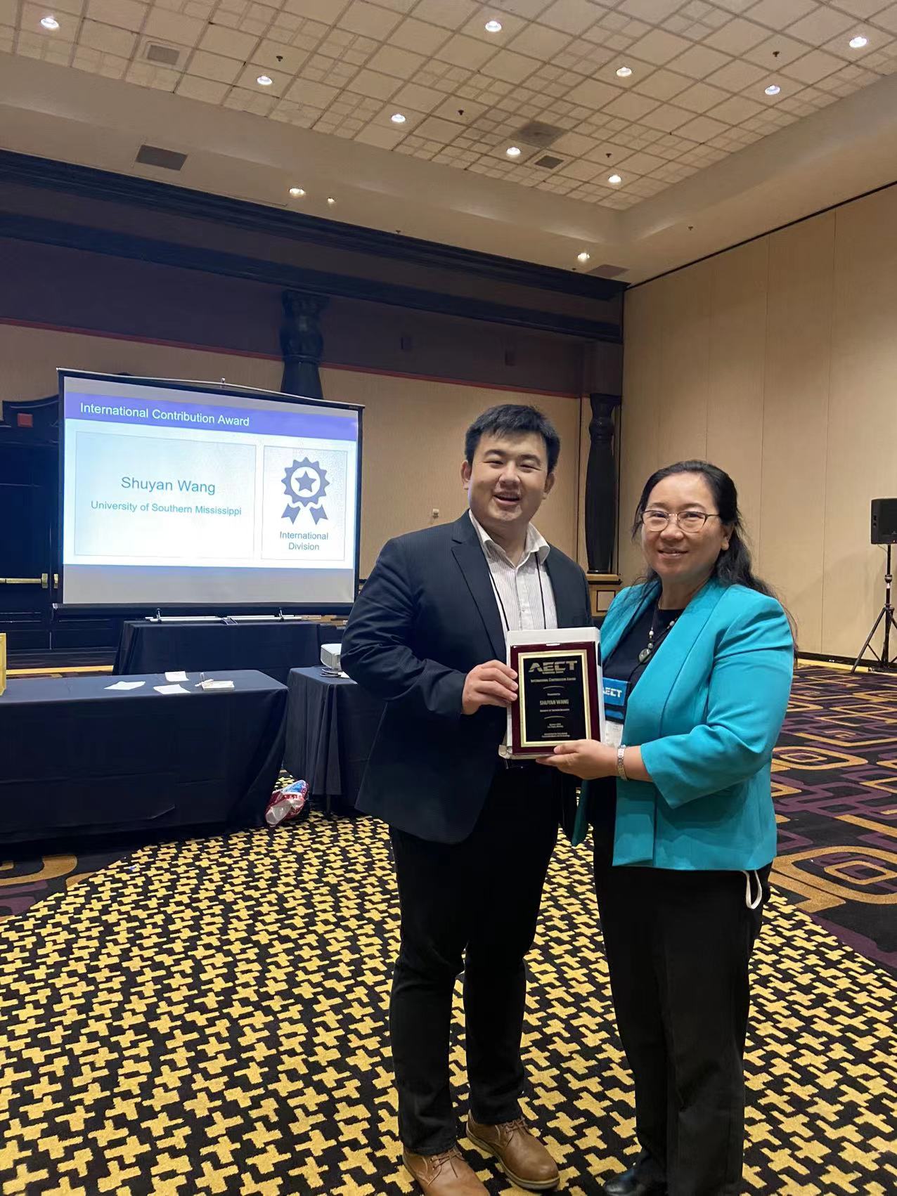 Dr. Shuyan Wang with award