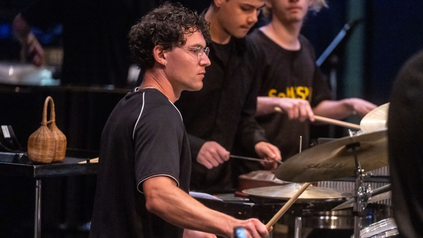 man playing drums