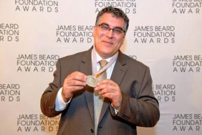 Andrew Haley accepting the James Beard Award for his book Turning the Tables