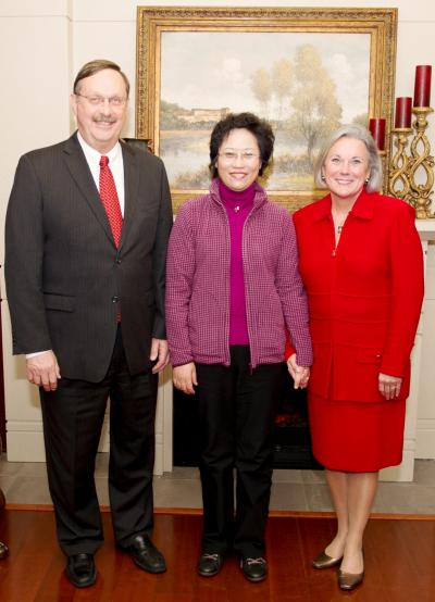 University of Southern Mississippi President Martha Saunders, right, and Interim Provost and Vice President for Research Denis Wiesenburg, left, welcomed a delegation from China's Linyi University, led by its chancellor, Ding Fenigyun, center, during their visit to the Hattiesburg campus Dec. 6. 