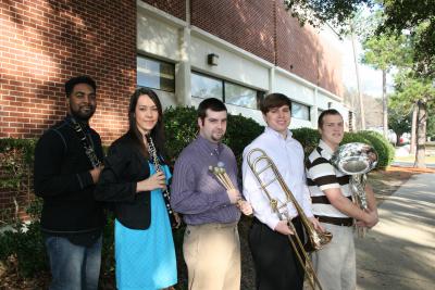 The University of Southern Mississippi Wind Ensemble will present a concert of student concerto winners Thursday, March 21 at 7:30 p.m. in Bennett Auditorium on the Hattiesburg campus. Featured on the program from left to right are Garrick Pitts, clarinet, from Fort Worth, Texas; Andrea Silverio, oboe, from Sao Paulo, Brazil; J. Cam Roberts, (BME), percussion, from Lucedale, Miss; Grant Futch, trombone from Lilburn, Georgia; and Jacob Wisdom, euphonium, from Pensacola, Fla. 