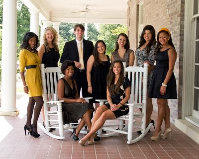 The 2012 Homecoming Court and Mr. and Miss Southern Miss include, standing, left to right: Senior Maid Miya Warfield, Freshman Maid Rhea Philips Valentine, Mr. Southern Miss Charles Alden Bennett III, Graduate Maid Jobina Khoo, Junior Maid Serena Williams, Sophomore Maid Emily Radcliffe, Student Body Maid Samantha Wells. Sitting, left to right: Miss Southern Miss Carmen Hall and Homecoming Queen Claire Dulaney.