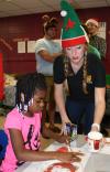 Honors College students host a holiday party for children at Aldersgate Mission.