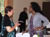 Helen Clark and Jennifer Ducksworth visit during the SPGE reunion.