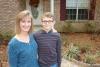 Kelly Champagne with her son Micah at their home in Petal, Miss.