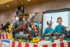 Competitors show off their robotic creations.