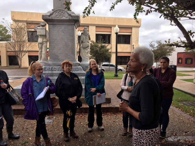 Lillie Easton, foreground, a resident of Hattiesburg’s Palmer’s Crossing Community, talks to USM students about the history of the civil rights movement in the Hattiesburg area during a field trip the students took part in as part of a USM History program class focused on the civil rights movement in Mississippi (USM photo by David Tisdale).  