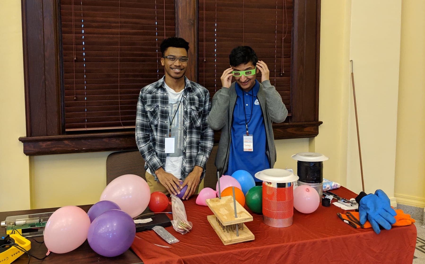 Physics students at booth