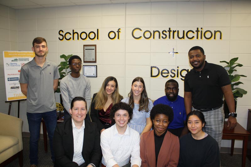 Students presenting at the USM Architectural Engineering Technology Program include, front row, left to right: Marissa Redmond, Lee Colt, Ogechi Oseji, Jennyfer Caracheo; back row, left to right: Brandon Prince, Curtis Washington, Karlee Hilliard, Holland Meier, Zachary Portlock, Antonio Darrington.