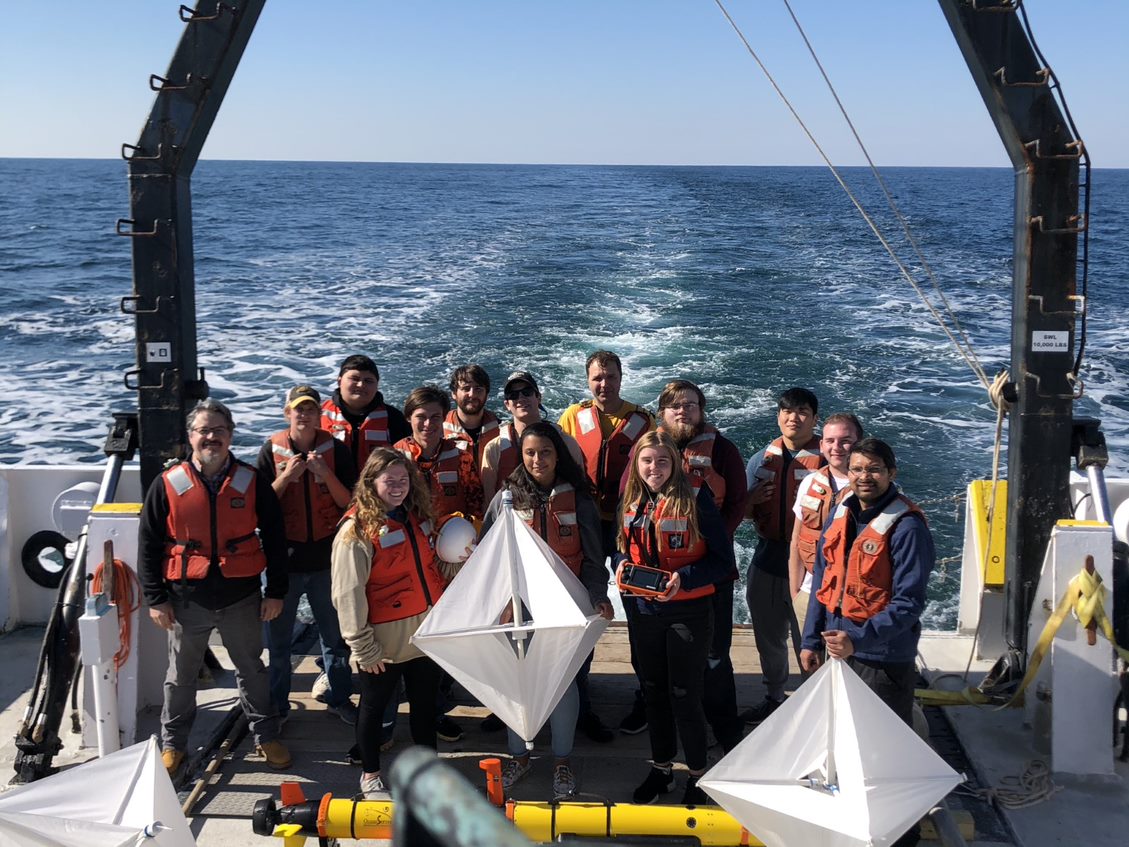 Photo of the graduates on a boat