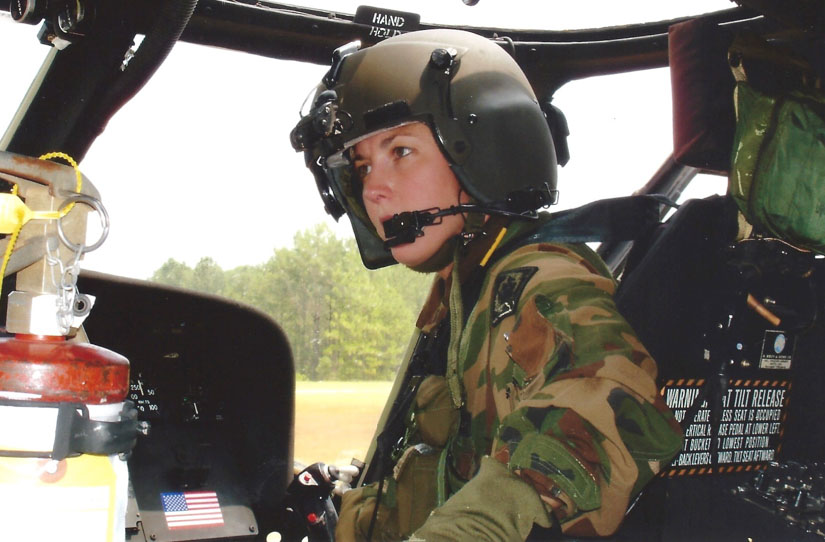 Dr. Stephanie K. Parks in the cockpit of a helicopter