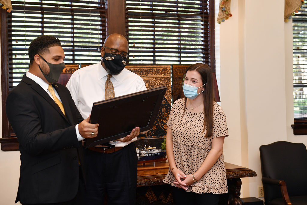 President Bennett with SGA Chief of Staff Olivia Williams and SGA President Lucas Williams