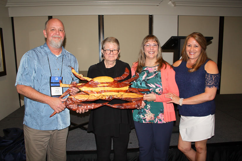 Pictured left to right: Read Hendon, Harriet Perry, Jill Hendon, and Lisa Hendon. Read Hendon and Harriet Perry are former directors of the Center for Fisheries Research and Development. Jill Hendon serves as the current director. Lisa Hendon previous worked at CFRD. 