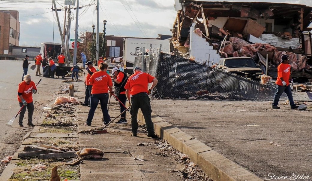 Residents of Mayfield, Kentucky work alongside volunteers from across the country to recover from tornadoes that struck the state and throughout the Midwest in December.