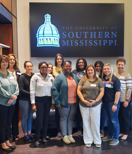 Pictured is the initial cohort of USM’s accelerated BSN pathway that began classes earlier this month. The group includes Robin Holman, pictured front row, second from right.
