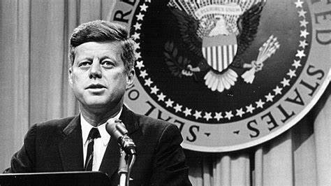 John F. Kennedy at a podium