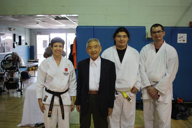 From left to right – Chop to the Top Coach Kaitlin Baudier, Takayuki Mikami, founder of the Japan Karate Association American Federation, Javion Comby, and Austin Moore at the 57th annual All-South Karate Championships.