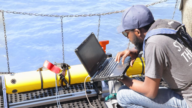 Looking at equipment on a boat