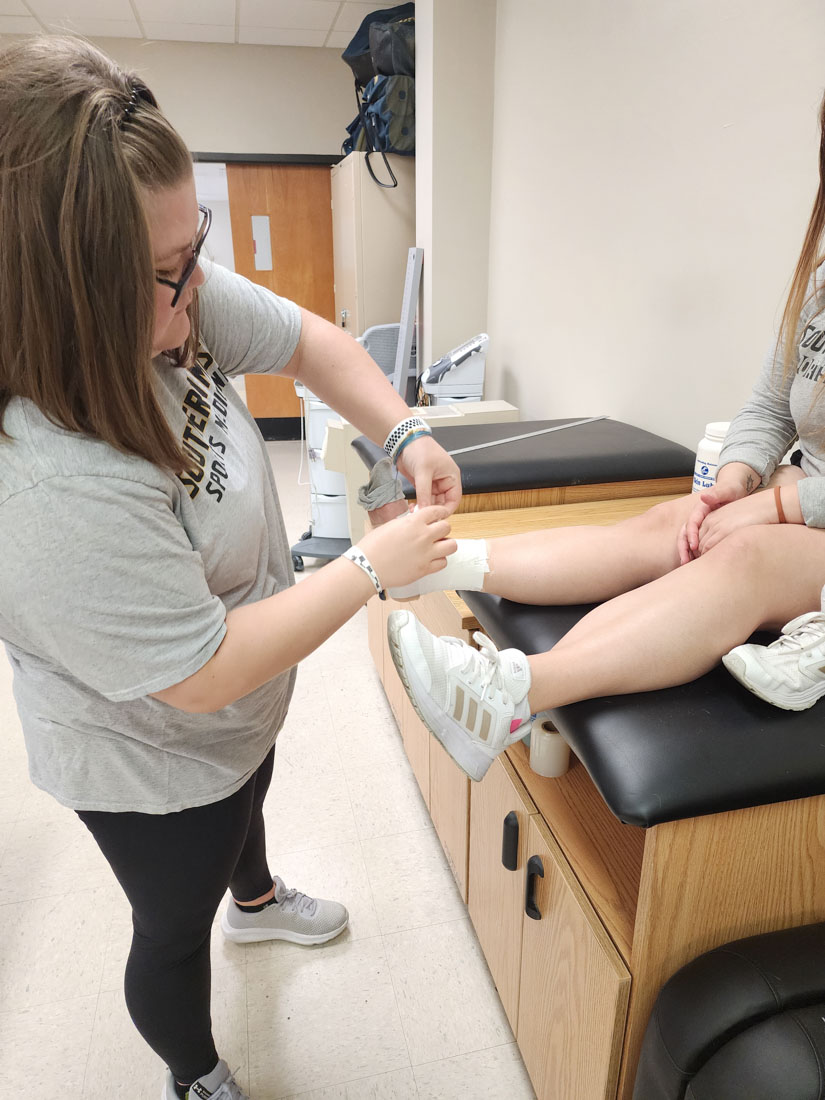 Nurse helping patient