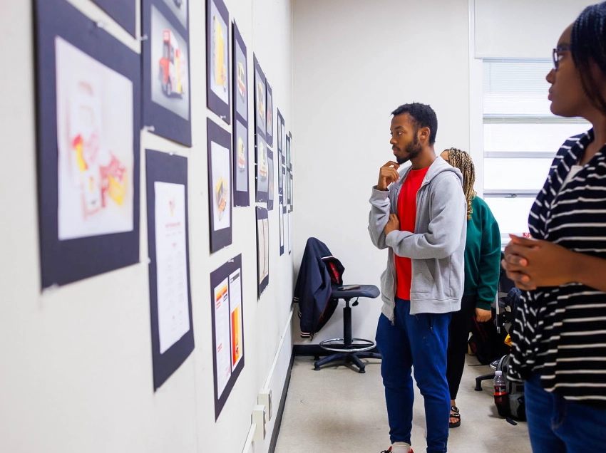 students looking at art