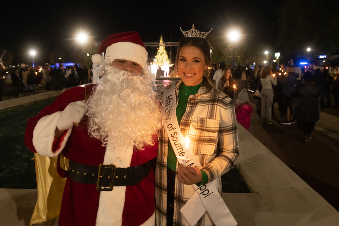 Santa Claus and Miss USM at Lighting the Way  / Photo by Kelly Dunn