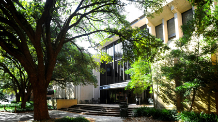 Exterior photo of shady entrance to R.C. Cook University Union