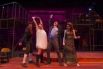 Students performing in Spring Awakening