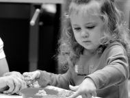 child learning and playing in classroom