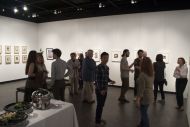Students and Faculty enjoy the pieces on display at the 2015 Faculty Show