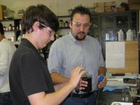 photograph of SEED student working with Dr. Wallace (right) in lab